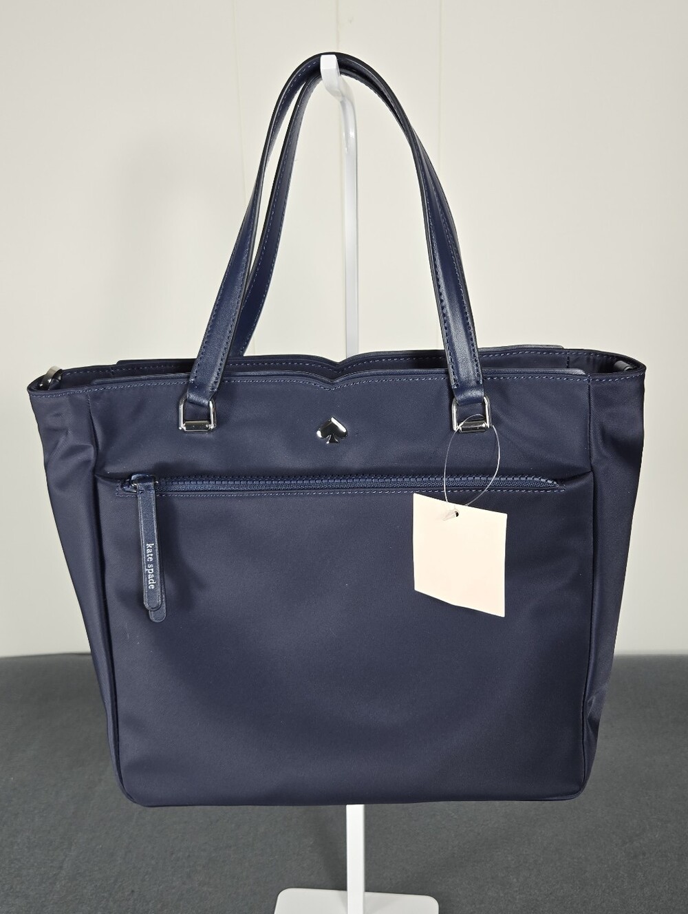 kate spade navy structured tote with front zip pocket
